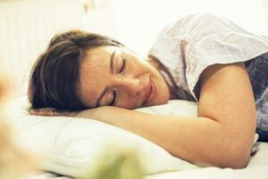 sleeping woman skin breakout mfine